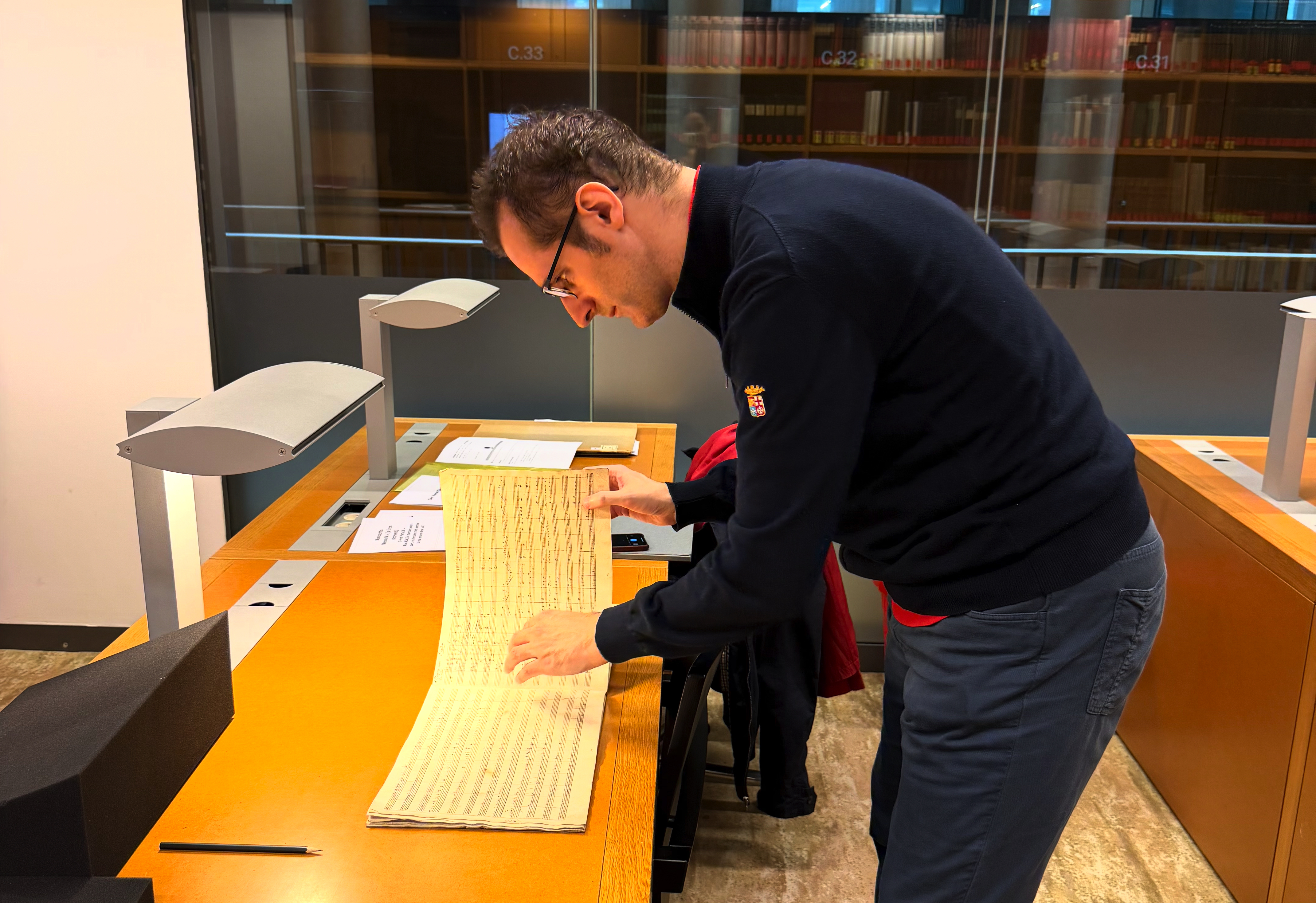Here is yours truly carefully handling one of the few surviving manuscripts by Dotzauer.